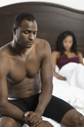 black-couple-in-bed-upset