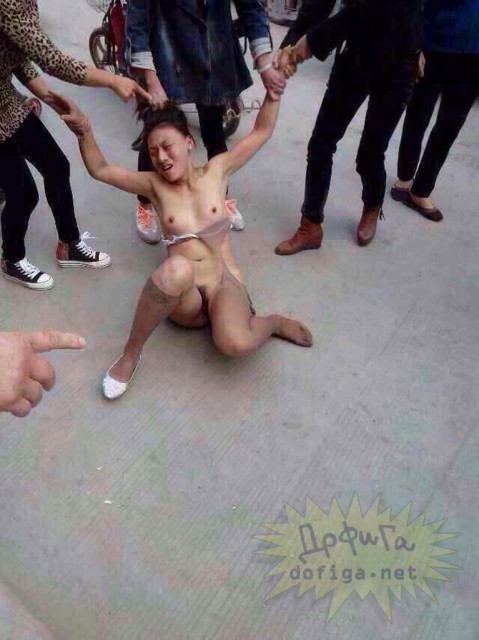 www.dailymail.co.uk/news/article-2791108/mob-rule-chinese-adulteress-stripp...