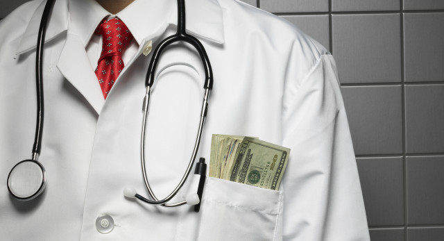 doctor-with-money-in-pocket-2