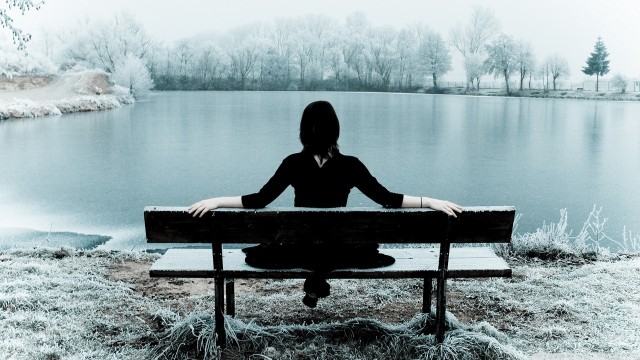woman_sitting_alone_on_a_bench-wallpaper-1280x720