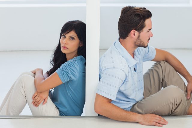 bigstock-sitting-couple-are-separated-b-48697304
