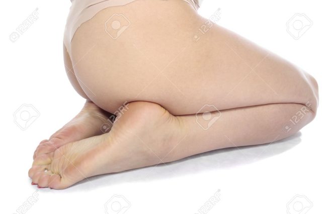 10038524-Woman-feet-legs-isolated-over-white-Stock-Photo-bare