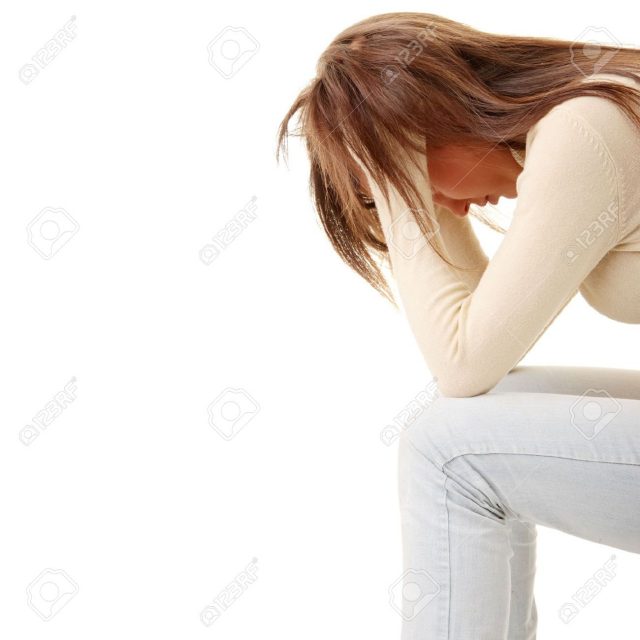 5364561-Teenage-girl-depression-lost-love-isolated-on-white-background-Stock-Photo